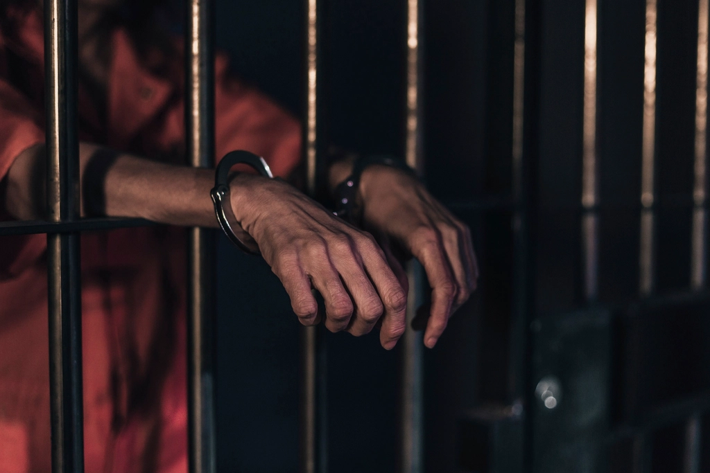 Free person handcuffed prison