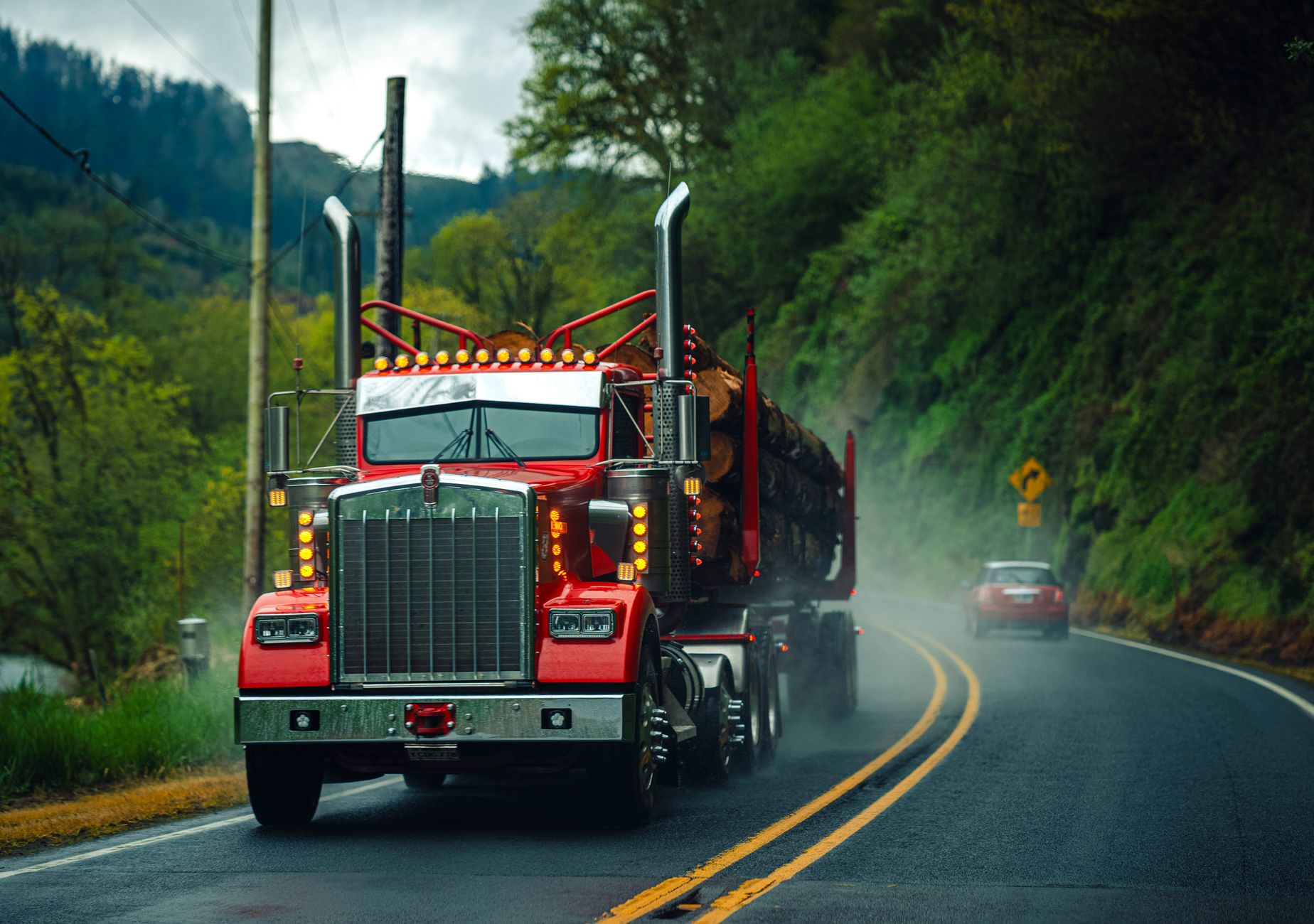 red semi truck on scenic oregon highway